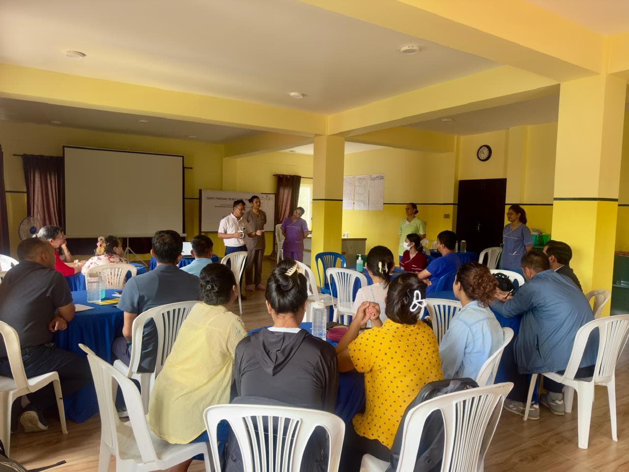 Participants gather for the opening session