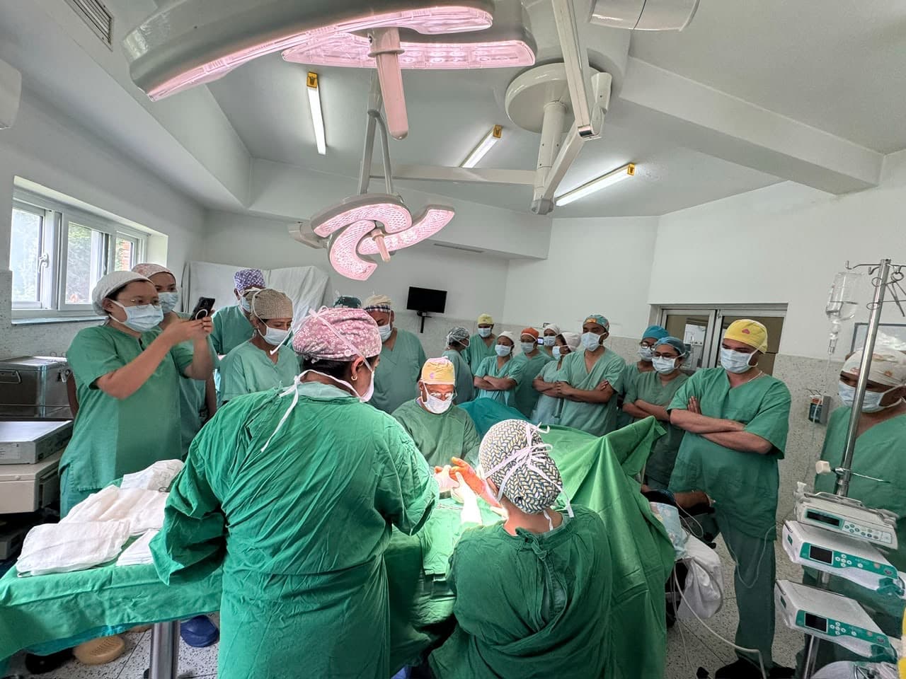 Observing the application of synthetic dressings and autograft placement