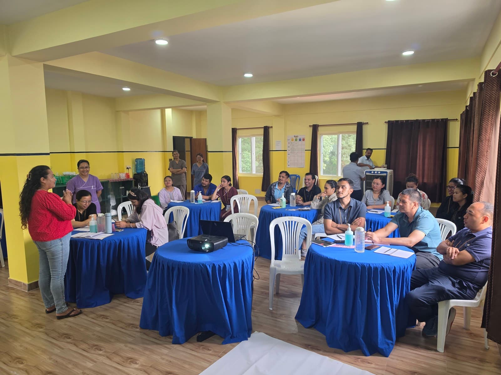 Participants at the opening session of day five