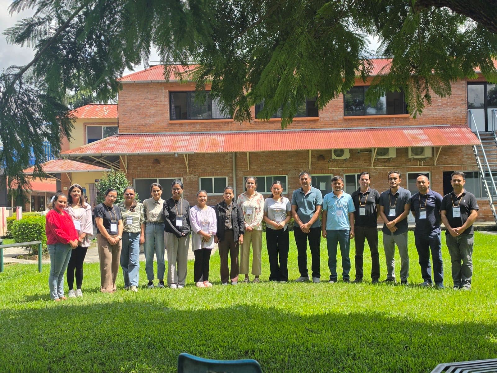 Participants and faculty outside the training venue