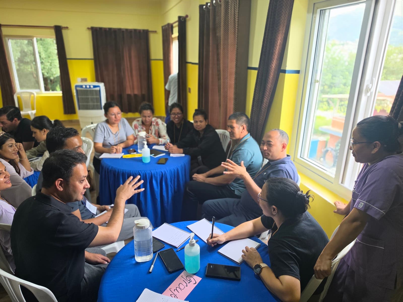 Group discussion in progress in the training hall