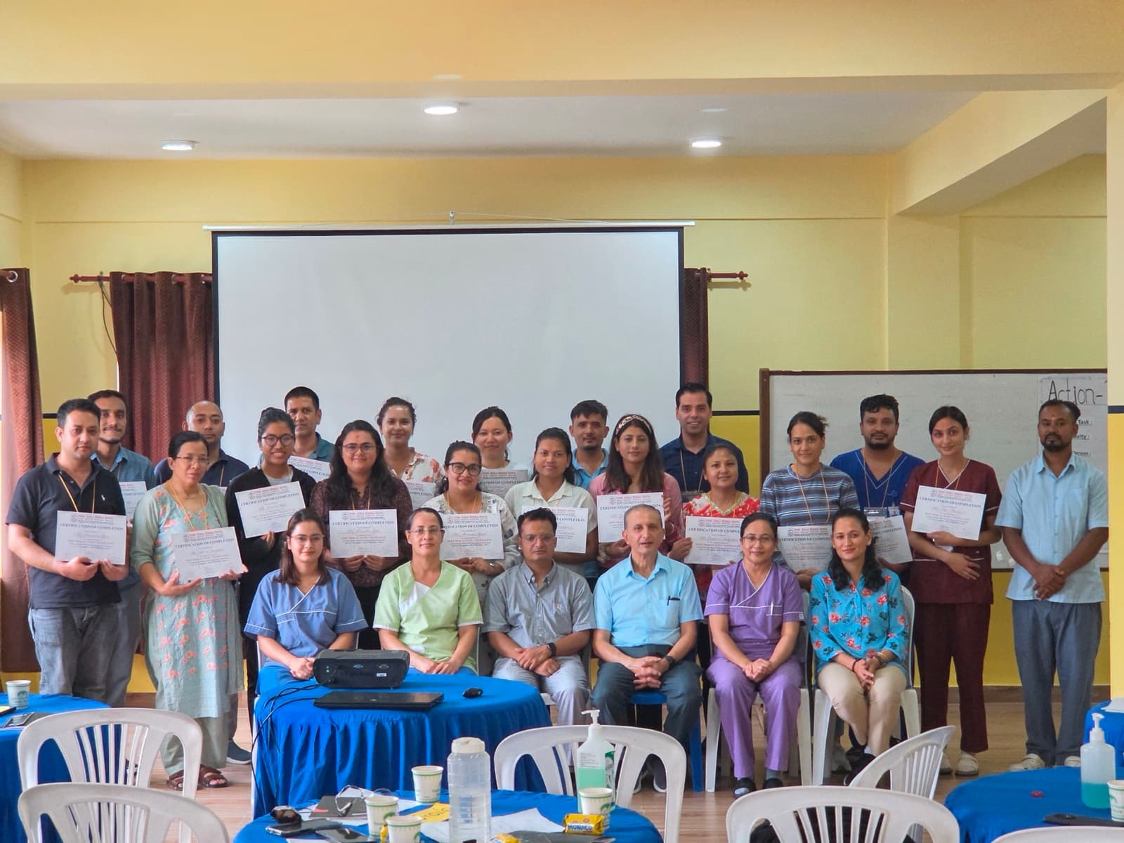 Participants with their certificates after the closing ceremony